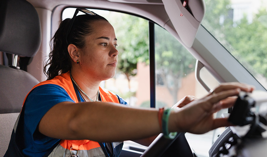 Woman_In_Car_Wearing_SafetyVest